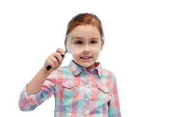Image showing happy little girl looking through magnifying glass
