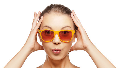 Image showing surprised teenage girl in sunglasses