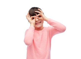 Image showing happy little girl making faces and having fun