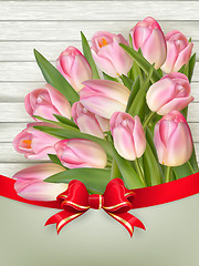 Image showing Pink tulips over white wood. EPS 10 