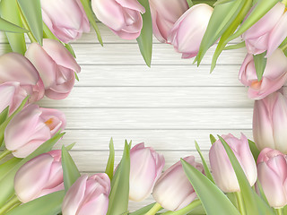 Image showing Color tulips on wooden background. EPS 10