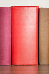 Image showing stack of books on the shelf