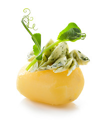 Image showing boiled potato decorated with dill and garlic butter