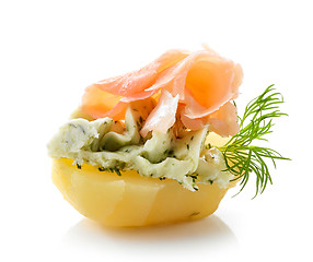 Image showing boiled potato decorated with dill and garlic butter and salmon