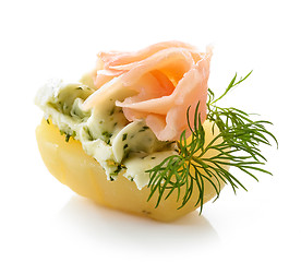 Image showing boiled potato decorated with dill and garlic butter and salmon