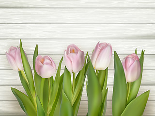 Image showing Pink tulips over white wood table. EPS 10