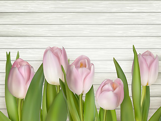 Image showing Pink tulips over white wood table. EPS 10