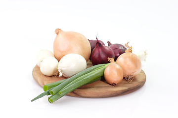 Image showing Onions on a kitchen board