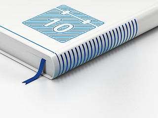 Image showing Time concept: closed book, Calendar on white background