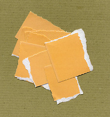 Image showing Yellow Torn paper pieces