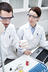 Image showing young scientists making test or research in lab