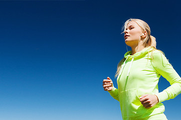 Image showing woman doing running outdoors