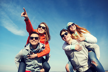 Image showing happy friends in shades having fun outdoors