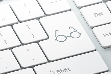 Image showing Learning concept: Glasses on computer keyboard background