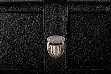 Image showing Buckle of old black leather suitcase