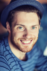 Image showing happy young man in hipster hat