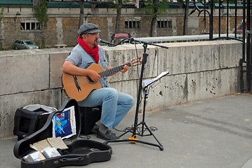 Image showing Guitarist on street.