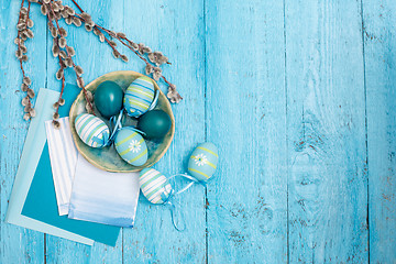 Image showing Easter eggs on wooden background
