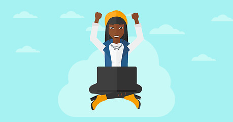 Image showing Woman sitting on cloud with laptop.