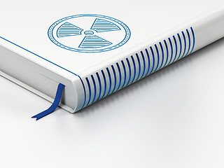 Image showing Science concept: closed book, Radiation on white background