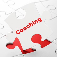 Image showing Learning concept: Coaching on puzzle background