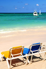 Image showing Chairs on sandy tropical beach