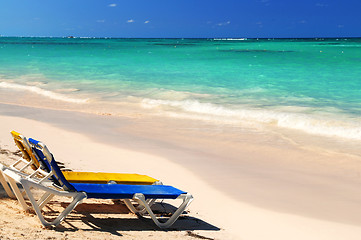 Image showing Chairs on sandy tropical beach