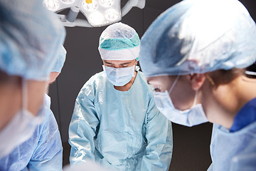 Image showing group of surgeons in operating room at hospital