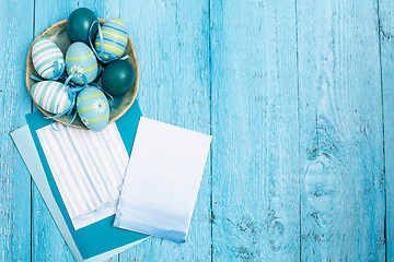 Image showing Easter eggs on wooden background