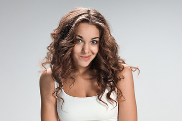 Image showing The young woman\'s portrait with happy emotions