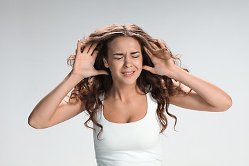 Image showing Portrait of young woman with shocked facial expression