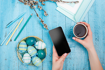 Image showing The top view of easter on wooden table office workplace