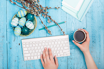 Image showing The top view of easter on wooden table office workplace