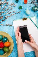 Image showing The top view of easter on wooden table office workplace