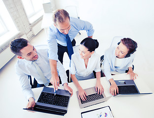 Image showing group of people working in call center