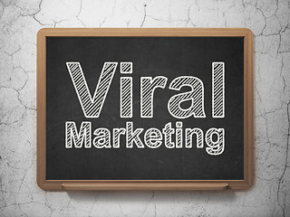 Image showing Advertising concept: Viral Marketing on chalkboard background