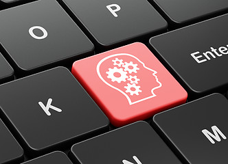 Image showing Studying concept: Head With Gears on computer keyboard background