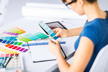 Image showing woman working with color samples for selection