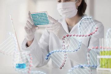 Image showing close up of scientist making test in lab