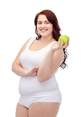 Image showing happy plus size woman in underwear with apple