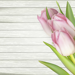 Image showing Pink tulips over white wood table. EPS 10