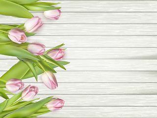 Image showing Pink tulips over white wood table. EPS 10