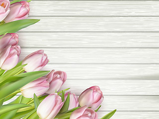 Image showing Bouquet of tulips on a wooden background. EPS 10