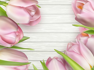 Image showing Pink tulips on wooden background. EPS 10