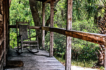 Image showing old rocking chair on porch