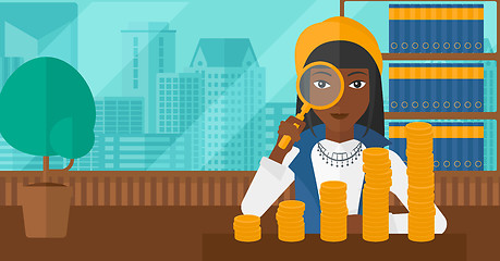 Image showing Woman with magnifier and golden coins. 