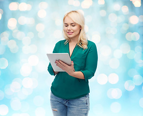 Image showing smiling woman with tablet pc computer