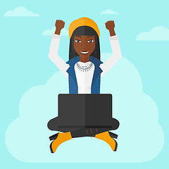 Image showing Woman sitting on cloud with laptop.