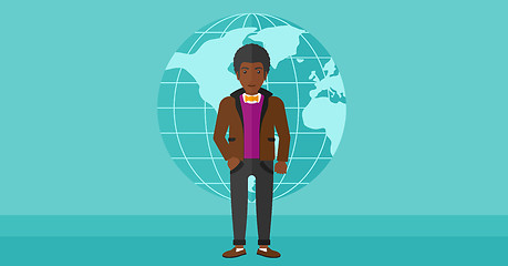 Image showing Businessman standing on globe background.