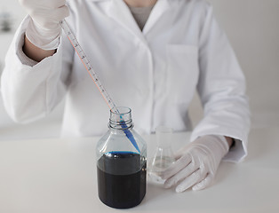 Image showing close up of scientist making test in lab